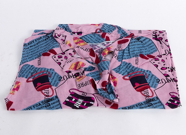 تاپ یقه گره‌ای نخی طرحدار