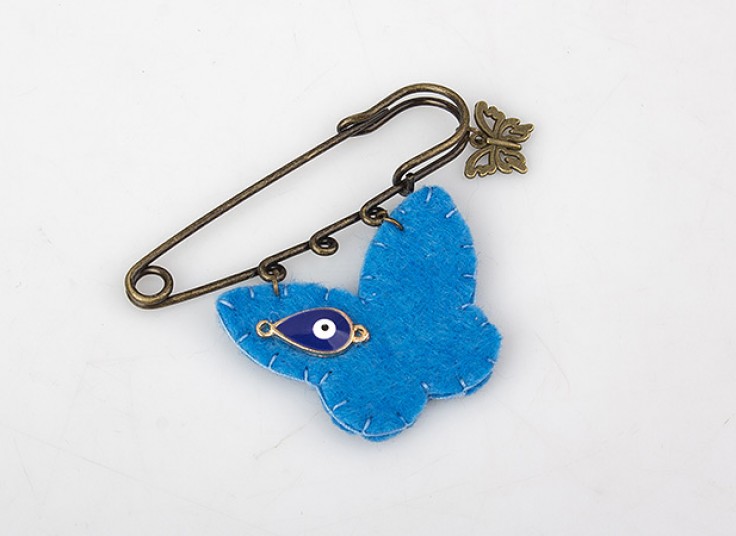 جاسوئیچی و سنجاق سینه