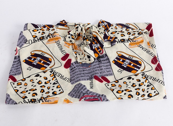 تاپ یقه گره‌ای نخی طرحدار