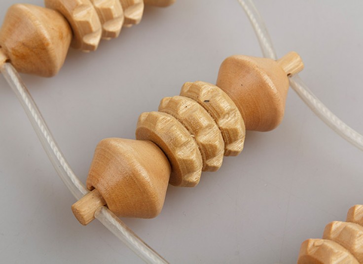 ماساژور مهره ای چوبی