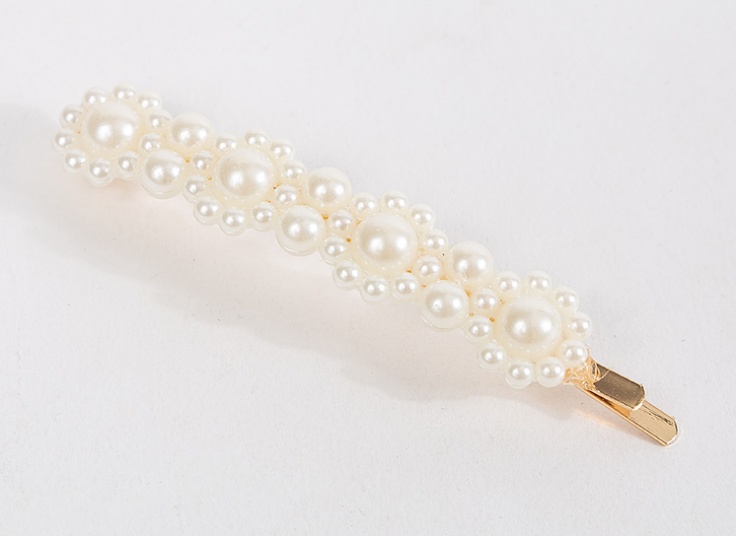 گیره مو و دستبند مرواریدی