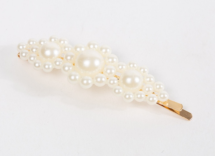 گیره مو و دستبند مرواریدی