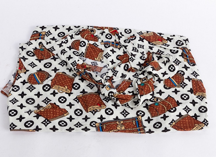 تاپ یقه گره‌ای نخی طرحدار