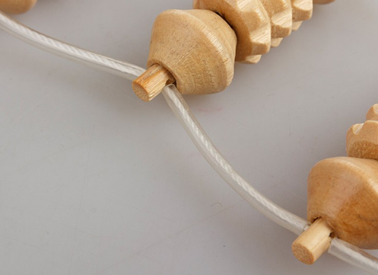 ماساژور مهره ای چوبی